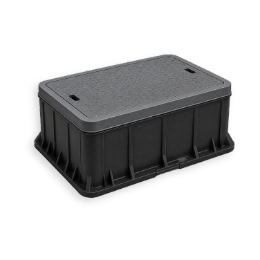 A heavy-duty rectangular grey underground pull box with a sealed composite lid on a transparent background.