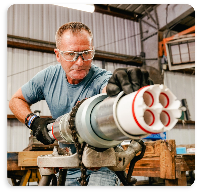 Man assembling OMNI OPTI-COM Multi-Duct Conduit